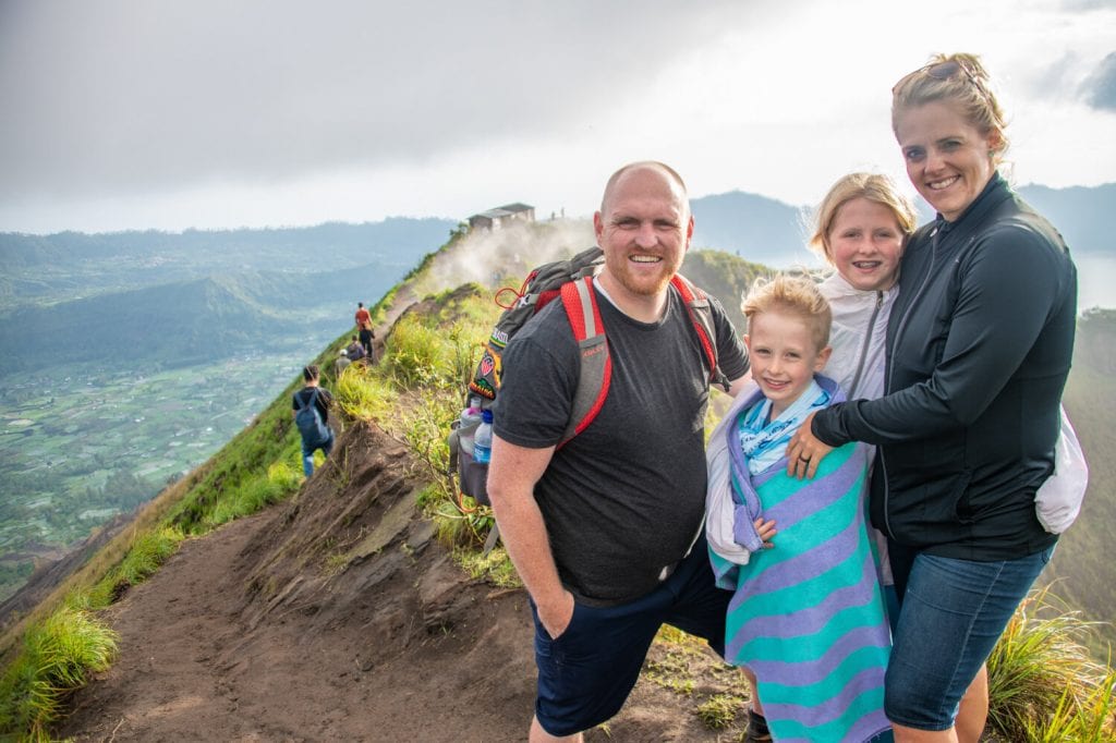 Traveling Bali- my family and I at the top of a mountain after a hike