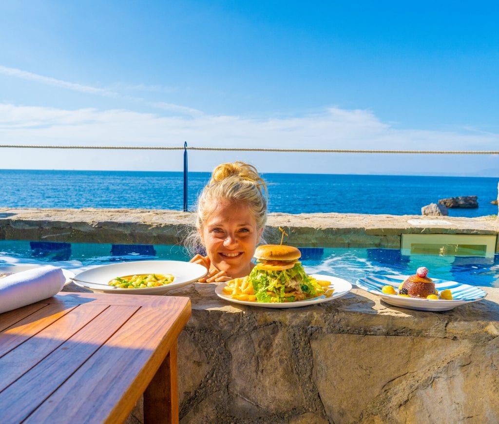 Leslie enjoying the room service from the private jacuzzi on our romantic getaway 