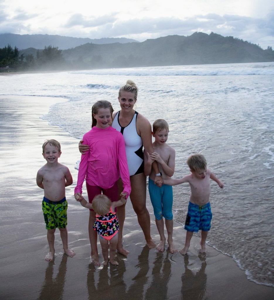 trip around the world- a family picture on the beach in Kauai.