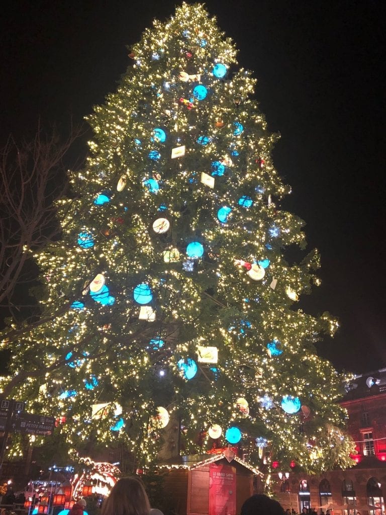 Christmas Markets in europe: the big lit up Christmas tree in the middle of the market
