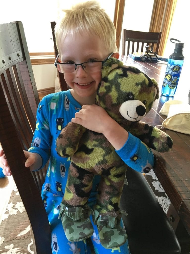 how to deal with homesickness- my oldest son and his camouflage teddy bear.