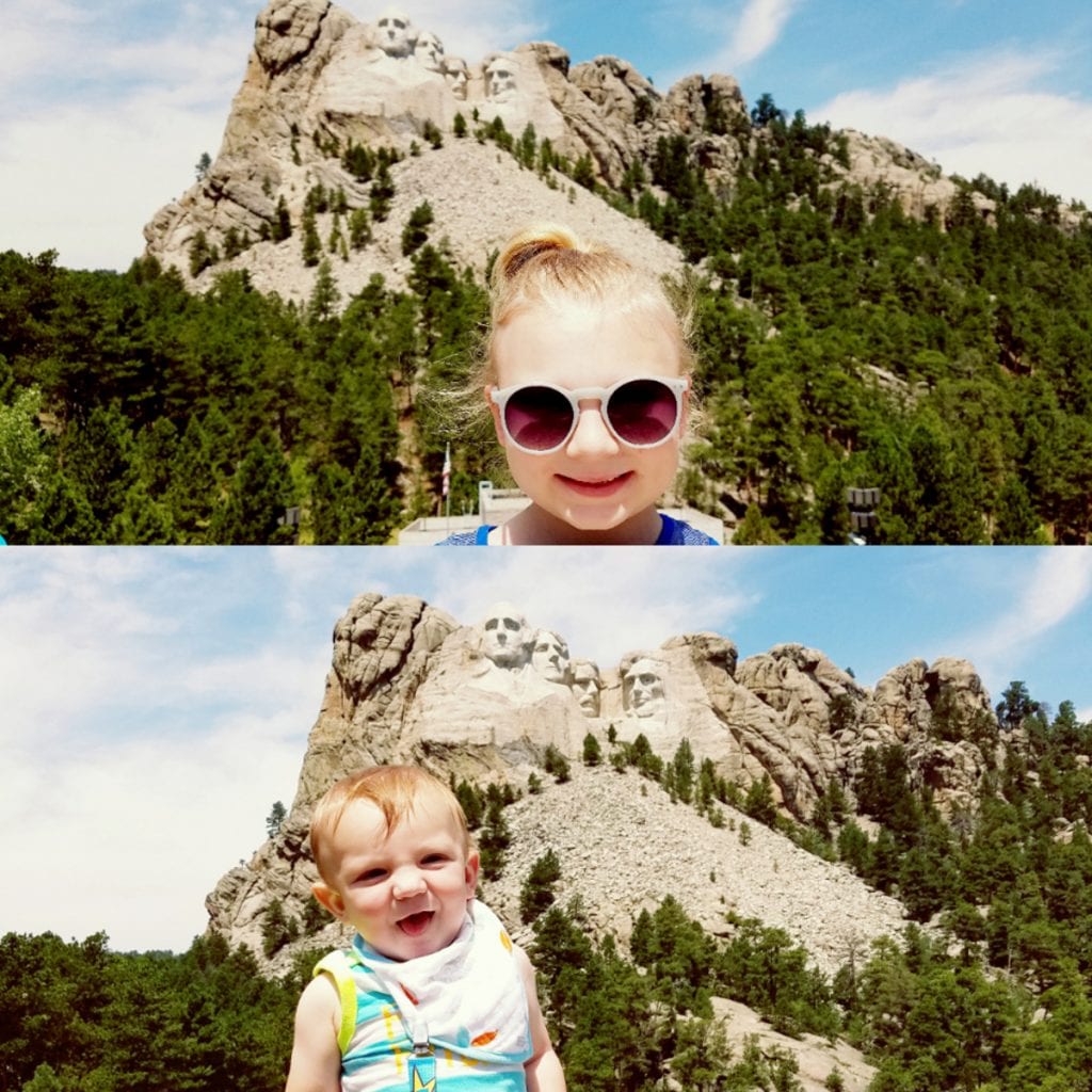 Both of the daughters in front of Mt. Rushmore 