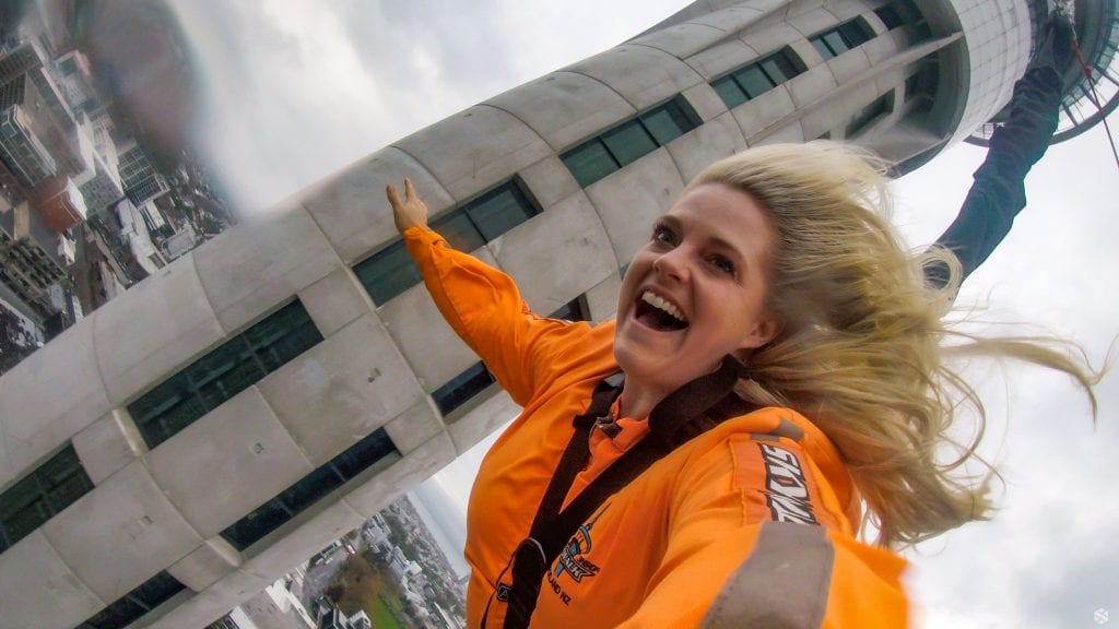 Leslie jumps from the Sky tower in New Zealand during their months there