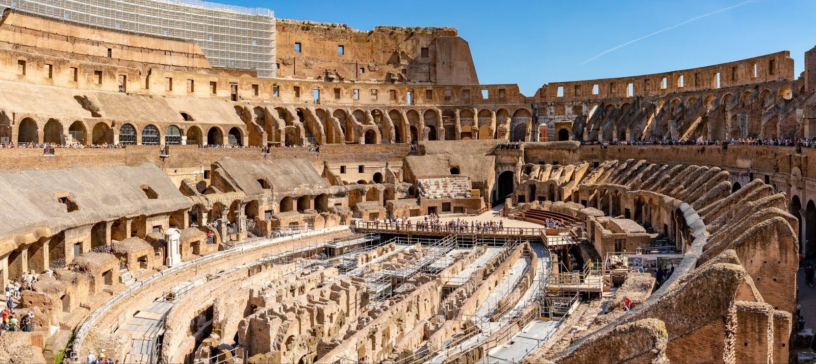 Panoramic interior view of the Colosseum arena and its underground structures.