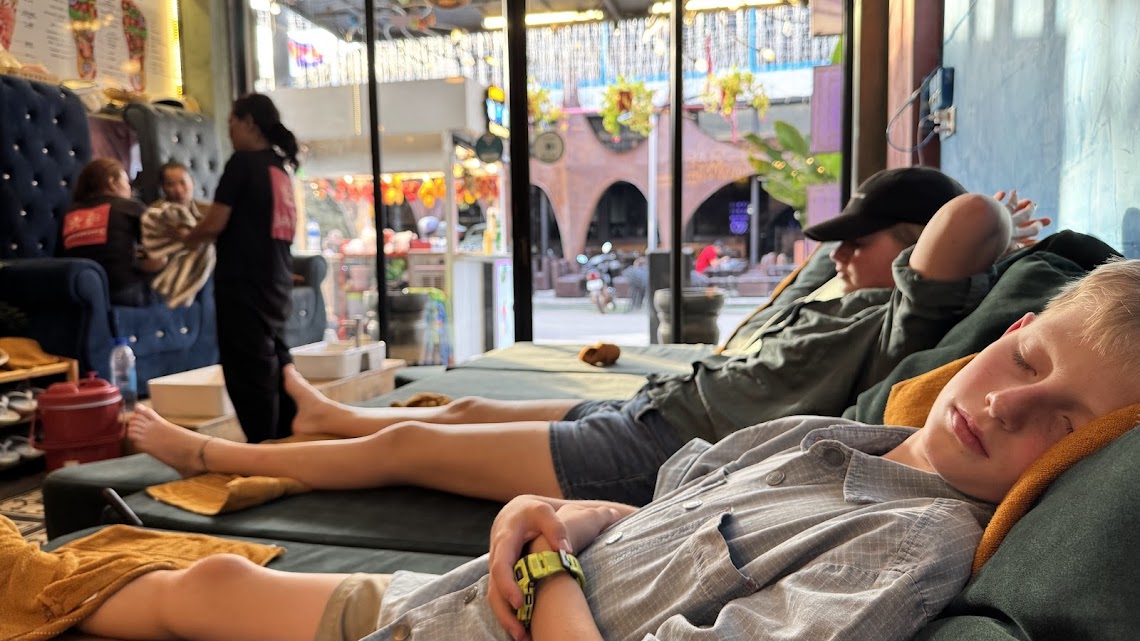 Family foot rub time!  Also a good nap spot.