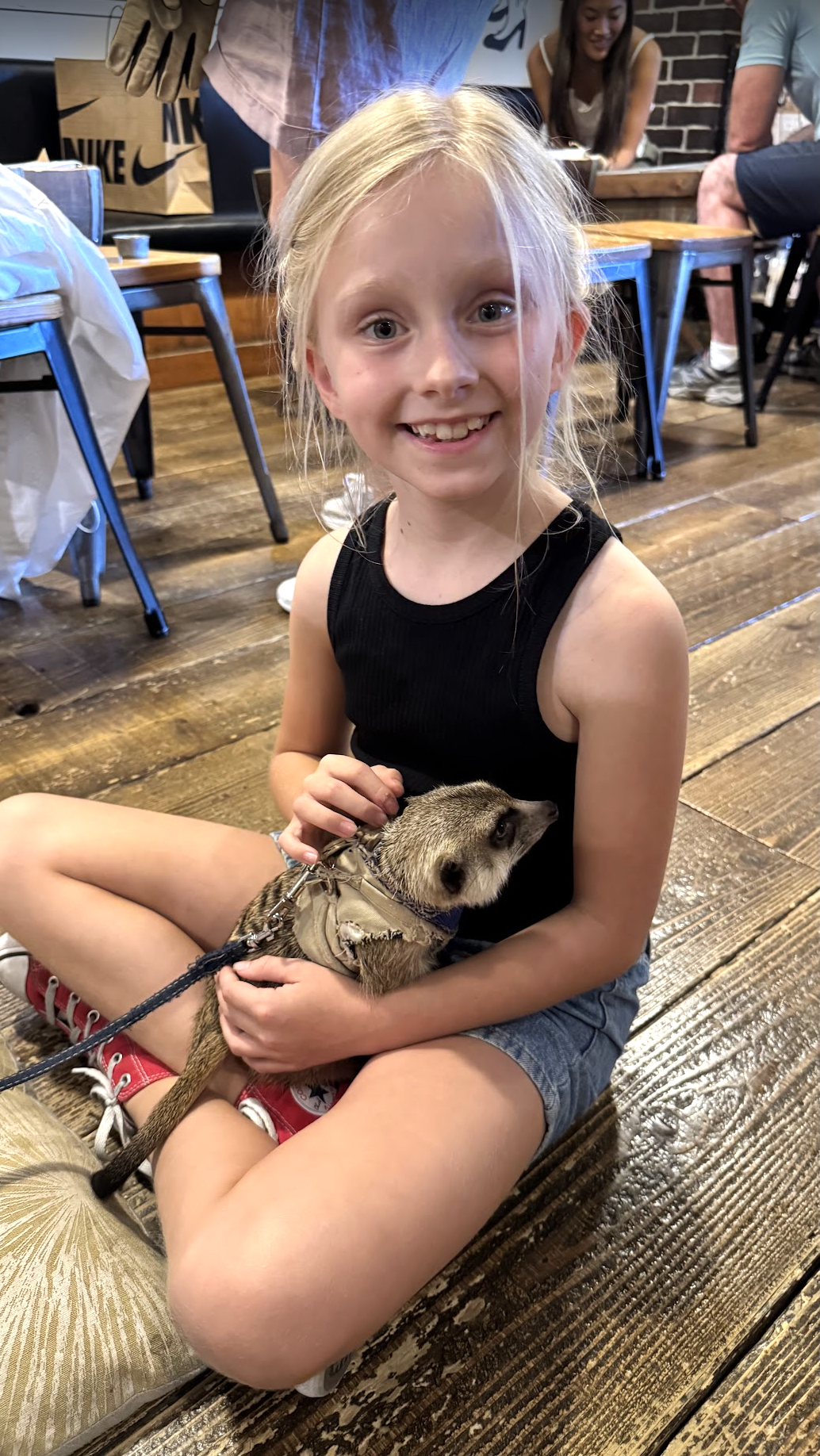 Grace was so excited when carrying the meerkat!
