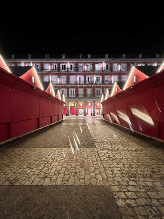 Red Cabins at Plaza Mayor, background building.